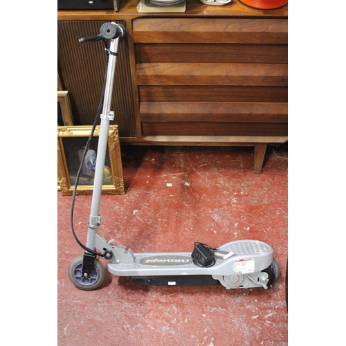 100 - An electric scooter and charger (working).