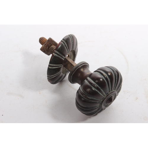 25 - An antique copper door knob.