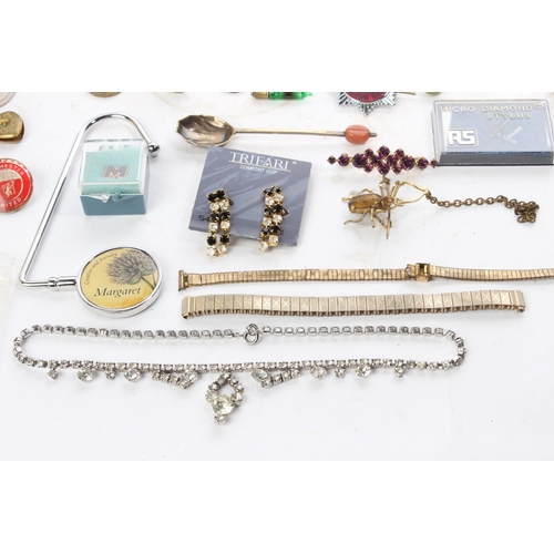 35 - An assortment of various costume jewellery.