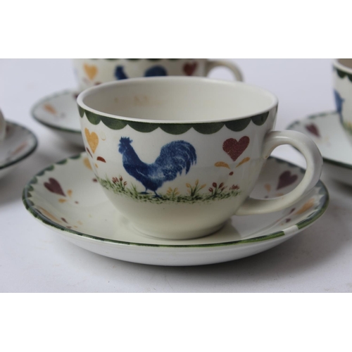 5 - A vintage tea set with decorative spongeware style design.