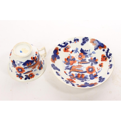 59 - An antique hand painted cup & saucer set.