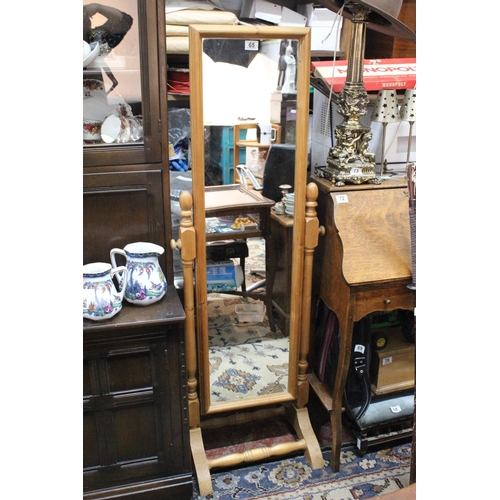 65 - A pine framed Cheval Mirror.