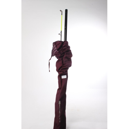 77 - A Leeda Merit Beach fishing rod in soft case.