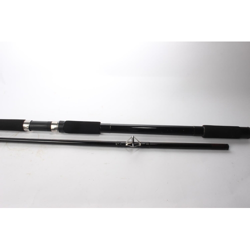 77 - A Leeda Merit Beach fishing rod in soft case.