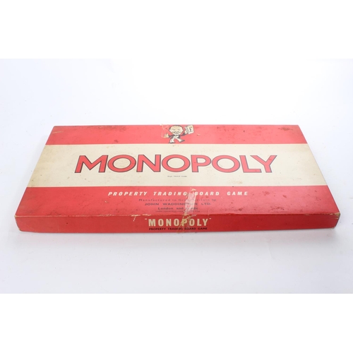 79 - A vintage Monopoly board game & wooden tray.