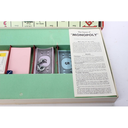 79 - A vintage Monopoly board game & wooden tray.