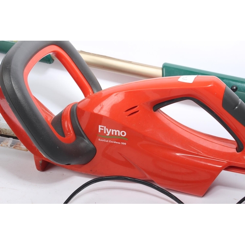 97 - A Flymo hedge trimmer & another.