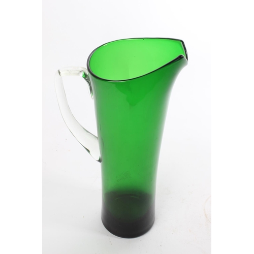 104 - A tall retro green glass jug.