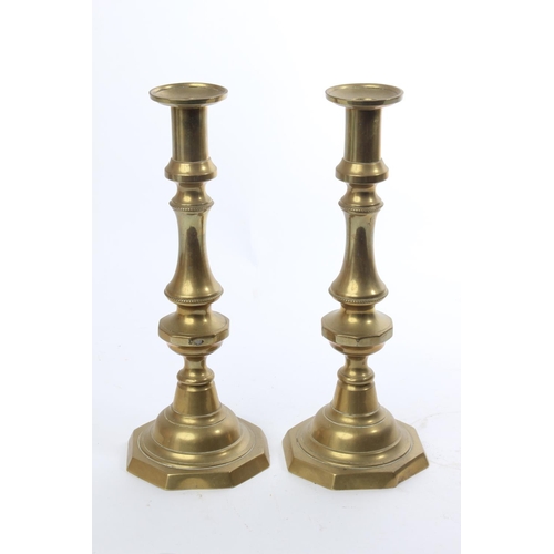 105 - A pair of large vintage brass candelsticks.