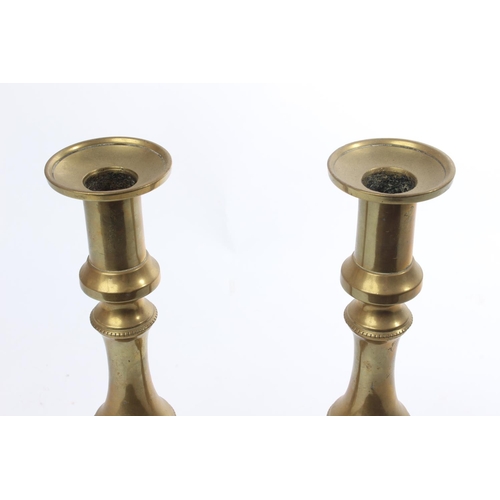 105 - A pair of large vintage brass candelsticks.