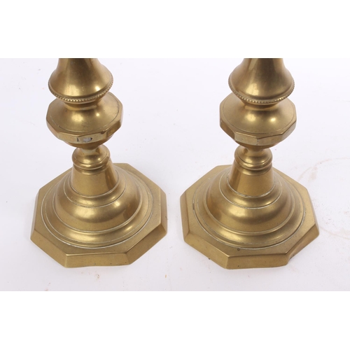 105 - A pair of large vintage brass candelsticks.