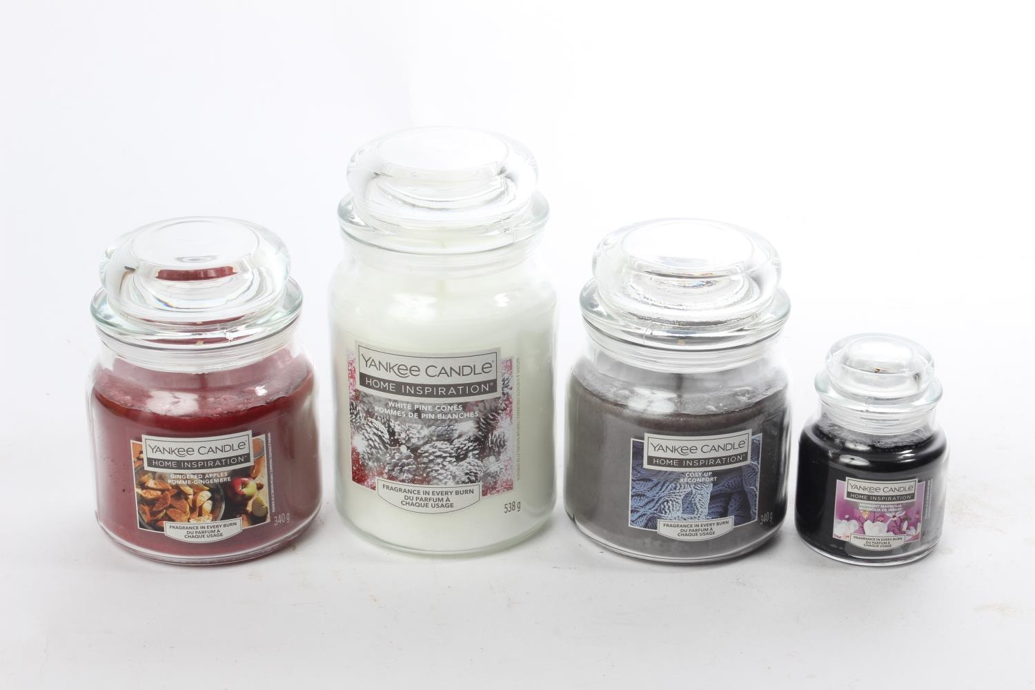 At Auction: 7 Yankee Candles- 1 used