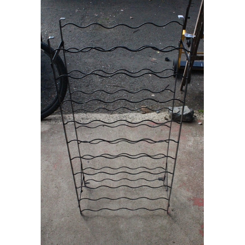 503 - A metal wine bottle rack.