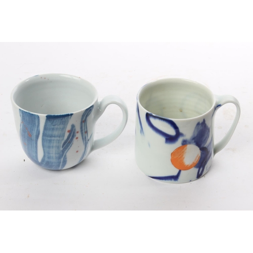 515 - A set of 2 studio pottery mugs by local ceramicist Adam Frew.