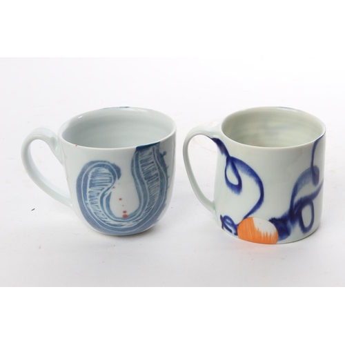 515 - A set of 2 studio pottery mugs by local ceramicist Adam Frew.