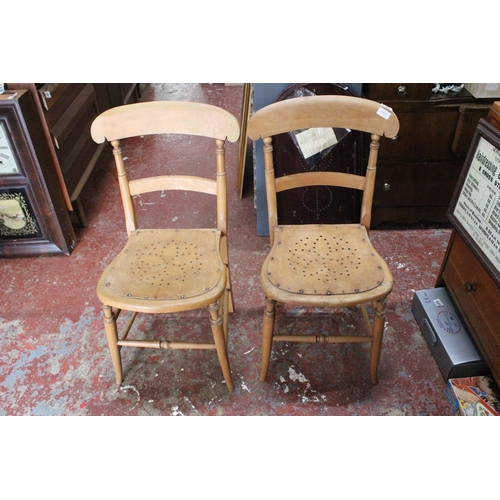 521 - A pair of antique occasional pine chairs.