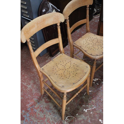 521 - A pair of antique occasional pine chairs.