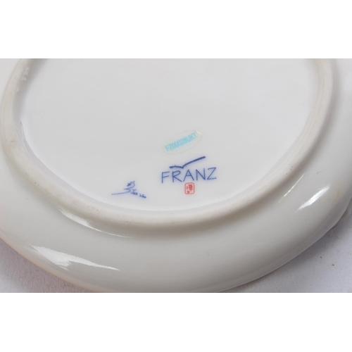 530 - A collection of 3 pieces of decorative Franz ceramics.