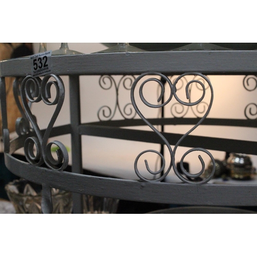 532 - A vintage/ retro wrought iron & glass demi lune table.