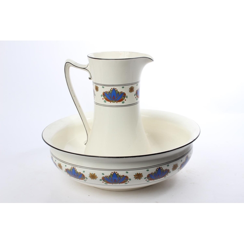 534 - A decorative antique Crown Ducal jug & basin set. (a/f)