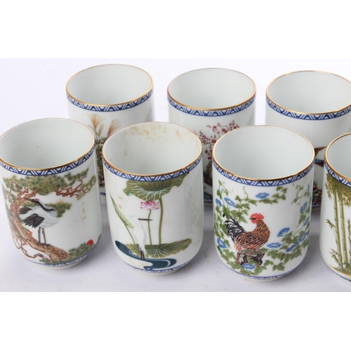 535 - A set of 12 decorative ceramic cups.