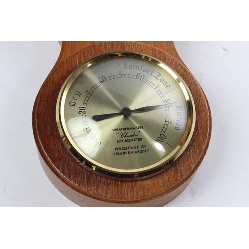 547 - A wall mounted barometer.