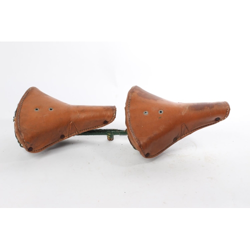 549 - A rare Terry Spring double bicycle saddle seat combination. Each of the two brown leather seats meas... 