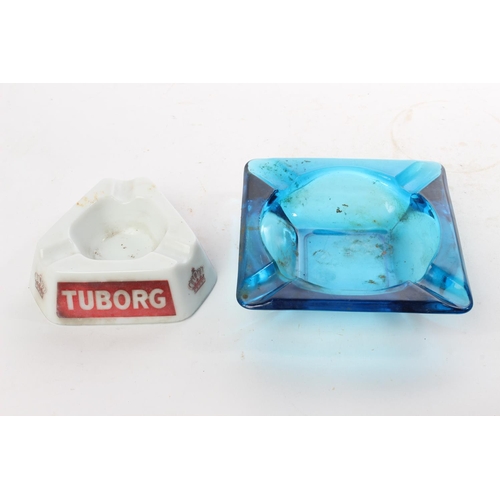 551 - A vintage Tuborg glass ashtray and another.