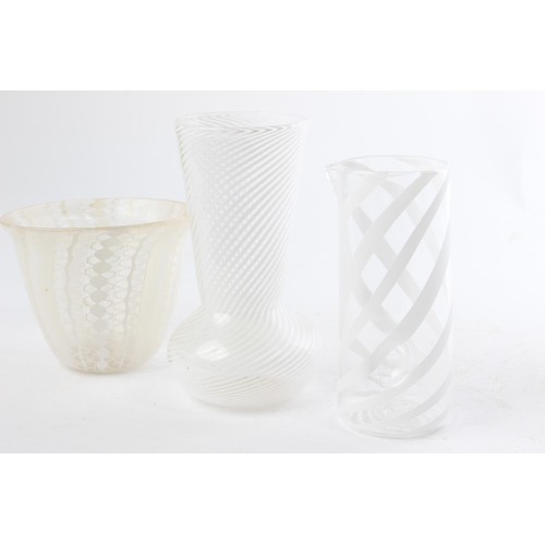 554 - Three decorative glass vases.