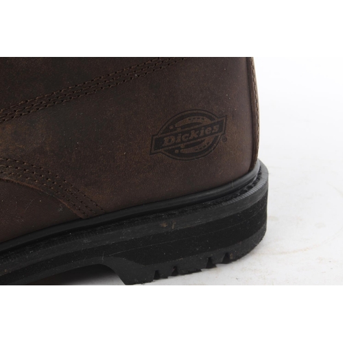 556 - A pair of Dickies size 7 work boots.