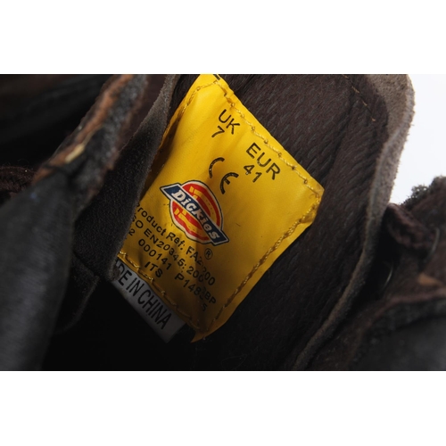 556 - A pair of Dickies size 7 work boots.