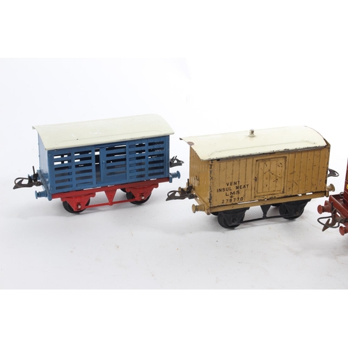 221 - Four vintage Hornby O Gauge wagons.