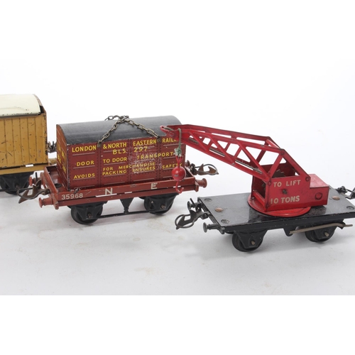 221 - Four vintage Hornby O Gauge wagons.