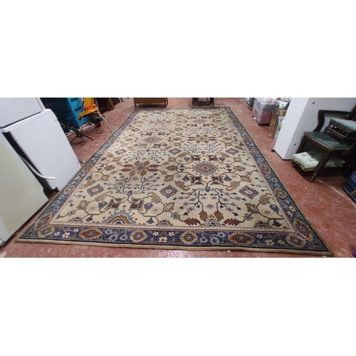 233 - A large vintage patterned floor rug.