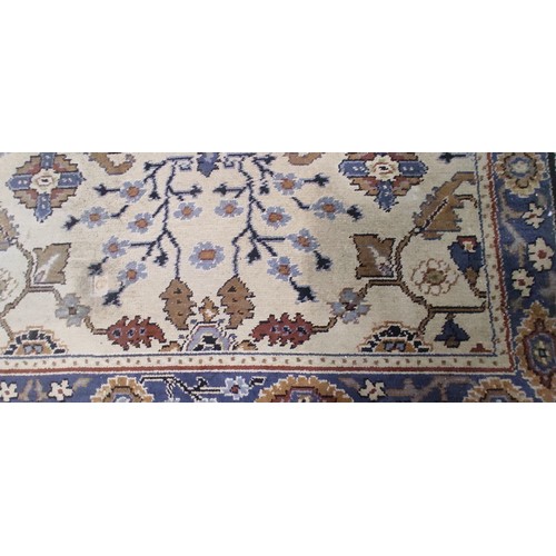 233 - A large vintage patterned floor rug.