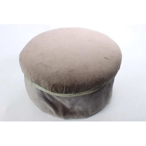 241 - An upholstered circular stool.