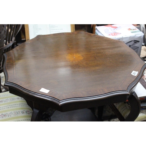 261 - A mahogany and inlay centre table with undershelf.