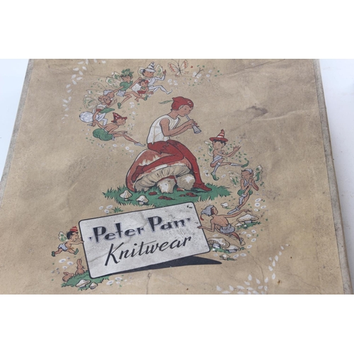 397 - A vintage Peter Pan Knitwear cardboard storage box and contents.