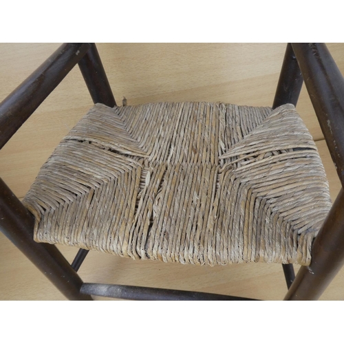 426 - A child's rattan seat chair (a/f).