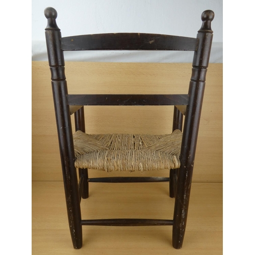 426 - A child's rattan seat chair (a/f).