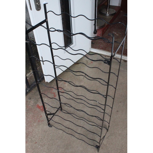 503 - A metal wine bottle rack.