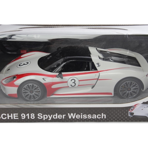 10 - A boxed Rastar Porsche 918 Spyder Weissach remote controlled car.