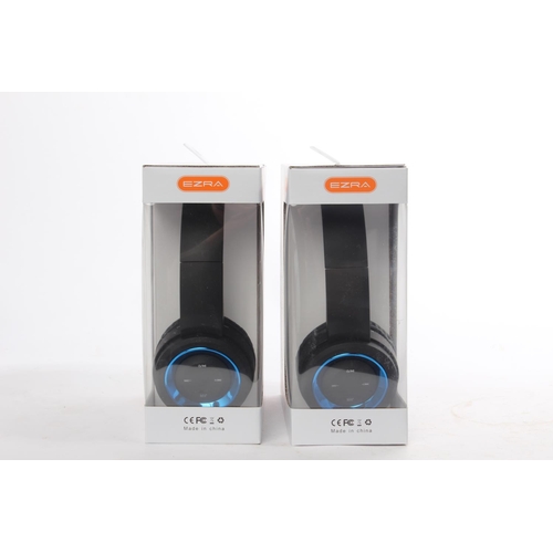 15 - Two boxed Ezra bluetooth headphones, model 9956.