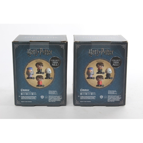 26 - Two boxed Harry Potter character lights.