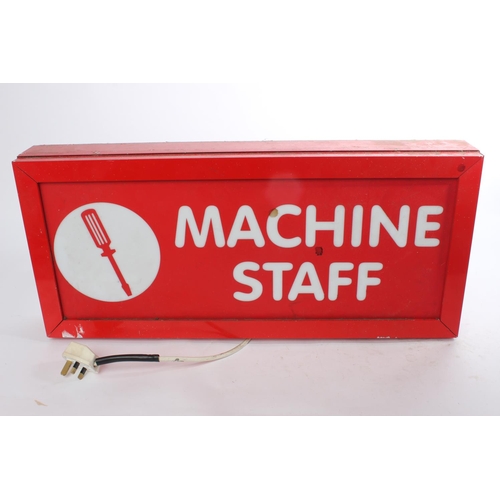 39 - A 'Machine Staff' light up sign, measuring 30cm x 70cm x 10cm,