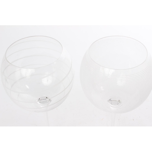 237 - A pair of Mikasa wine glasses.