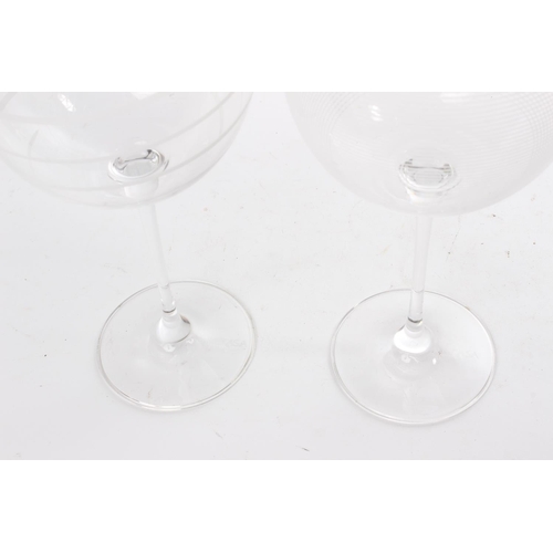 237 - A pair of Mikasa wine glasses.