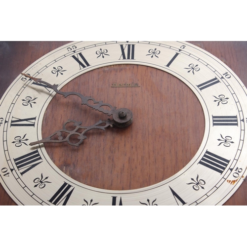 250 - A vintage double weighted wall clock.