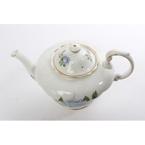 264 - A Paragon bone china teapot.