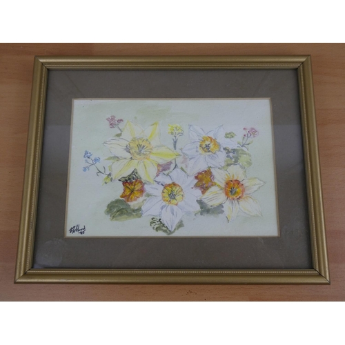 477 - A small gilt framed watercolour of spring flower, signed.